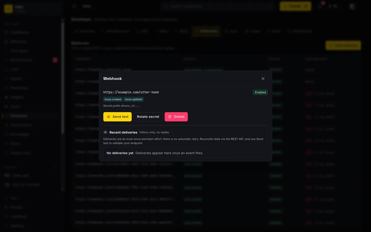A webhook's detail view with Send test, Rotate secret, and Delete controls above a Recent deliveries table